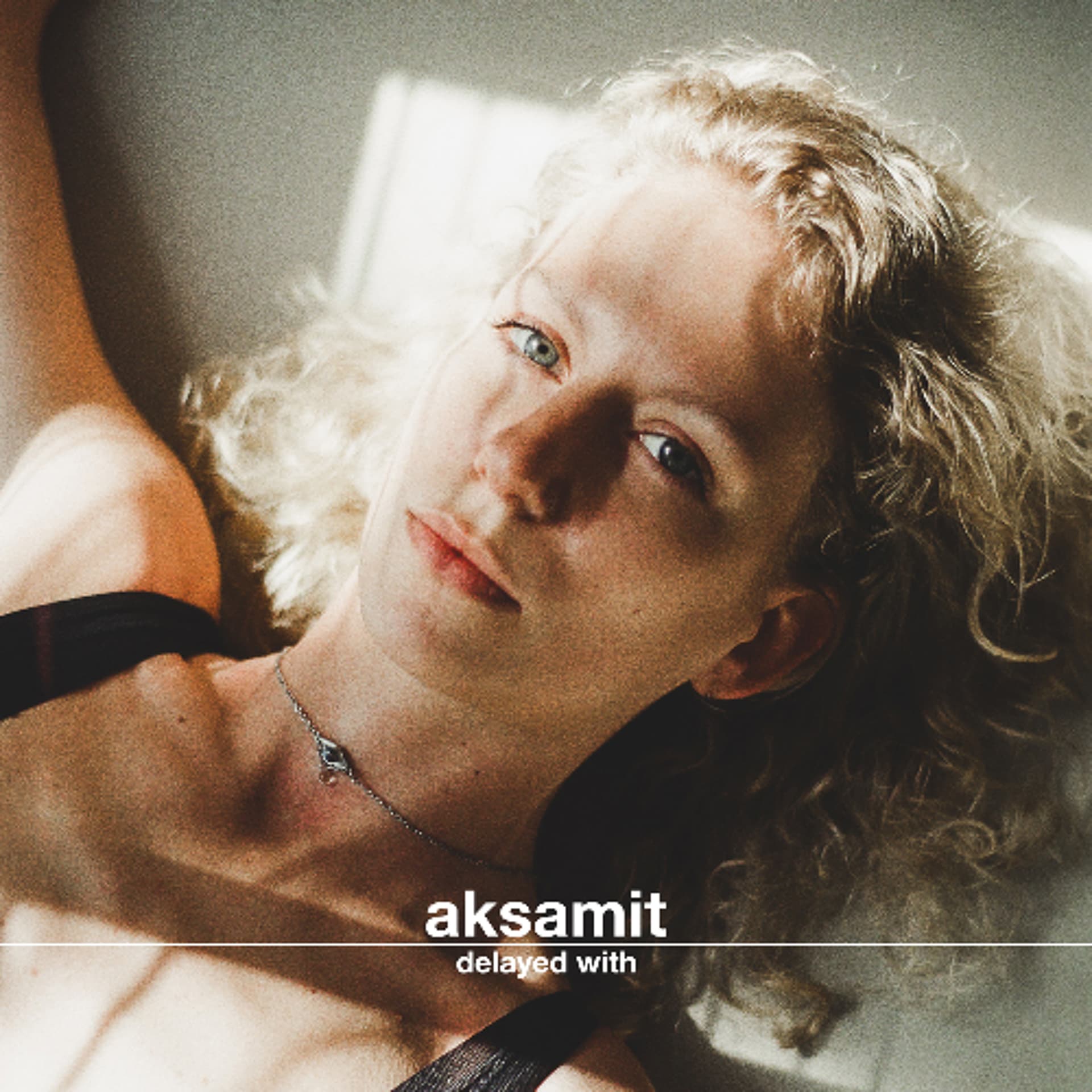 Delayed with... Aksamit - Delayed cover