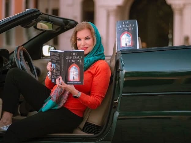 S5E1- a sit down with author Caryn Hacker-Buechel - Raising Cain cover