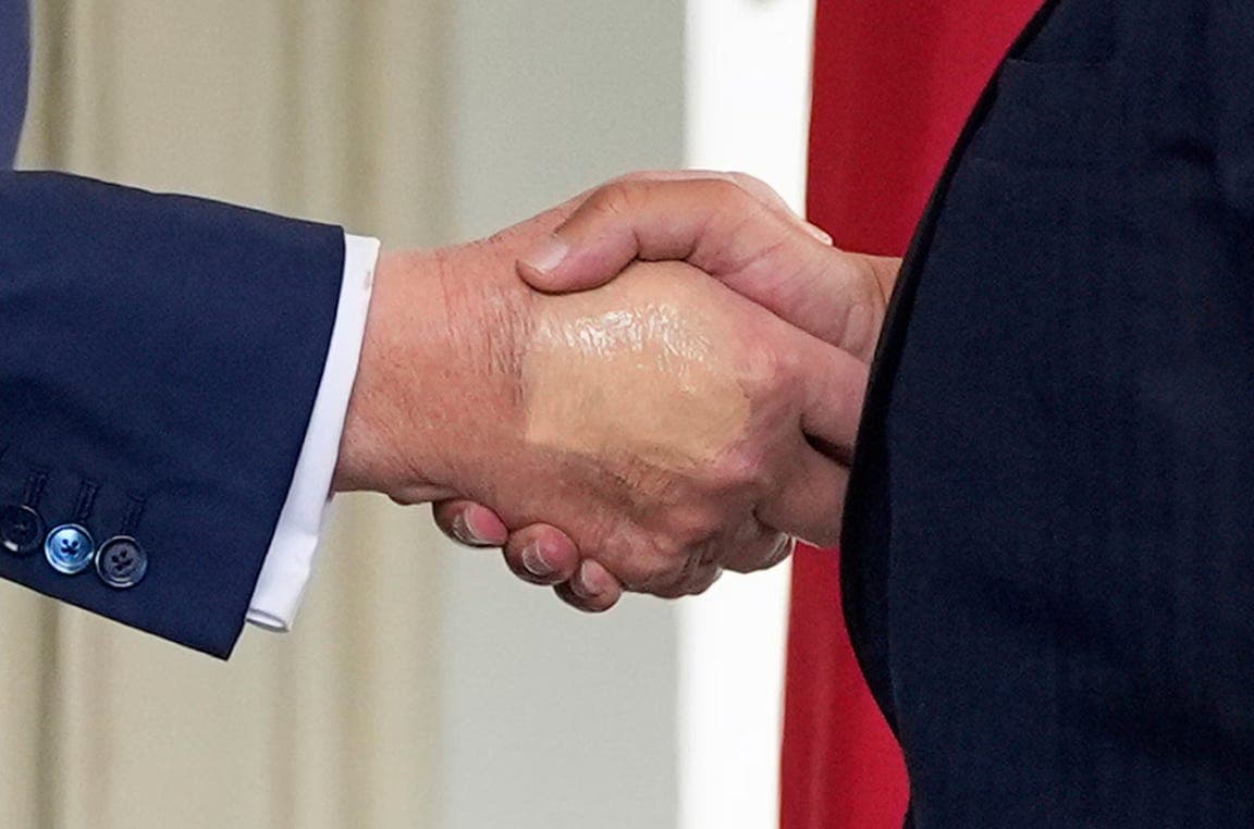 What the White House told me about Trump's hands - American Doom  cover